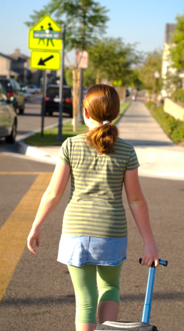 Girl crossing street